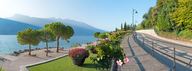 lakeside road Gardasee with stunning view to bathing area, Limone sul Garda, italy - obrazy, fototapety, plakaty
