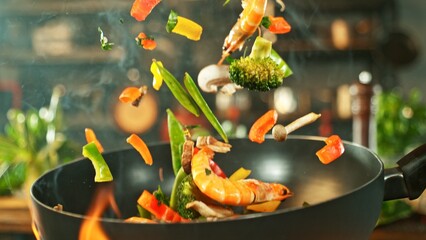 Freeze Motion of Wok Pan with Flying Asian Meal in the Air. - 750186648