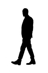 side silhouette of a man walking and dressed in a suit looking at camera on white background
