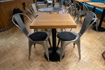 An Empty Closed Cafe with Dining Seats and Table