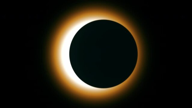 Total Solar Eclipse silhouette. Moon passing in front of the sun, creating a total solar eclipse and revealing the sun's corona.
