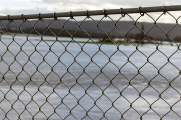 Security net on the bridge. Metal fence outdoor - 750190234