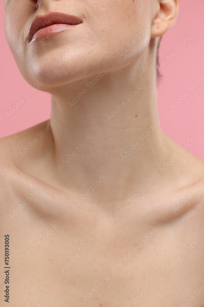 Wall mural beauty concept. woman on pink background, closeup