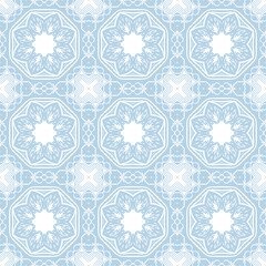 Blue and white patterned surface with geometric shapes