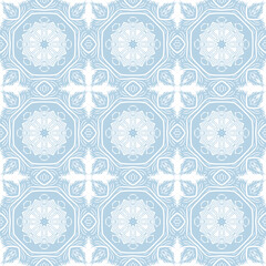 Blue and white patterned surface with geometric shapes