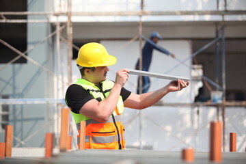  construction worker or factory worker at site.