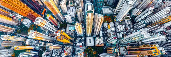 Foto op Plexiglas Aerial View of a Bustling City: Drone Shot Over Hong Kong, Capturing the Dense Urban Landscape and Architectural Diversity © MdIqbal