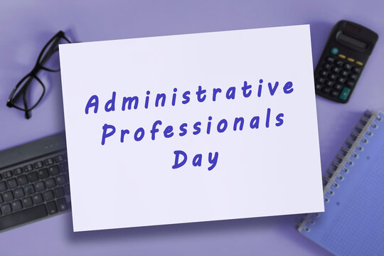 Administrative Professionals Day greeting card on a blurred background of office supplies. Administrative Assistants and Office Managers holiday.