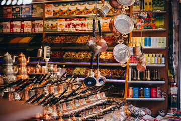 Turkish copper coffee pots and grinders, spices and tea on sale at one of the markets in Istanbul, Turkey. - 750223413