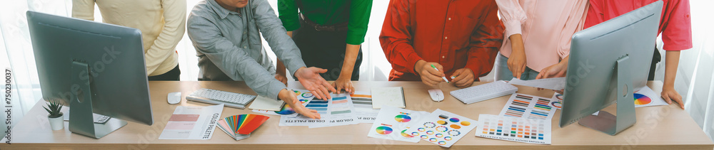 Poster a top view cropped imaged of creative graphic team selects colors carefully from color wheel and pal