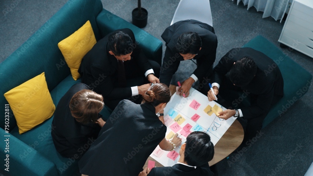 Aufkleber top view of business people hands making scrum task board to manage workflow in workplace. diverse m