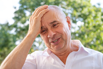 Close-up senior, 65s Caucasian man, experiencing unfortunate failure, self-irony, Coping Mechanisms...