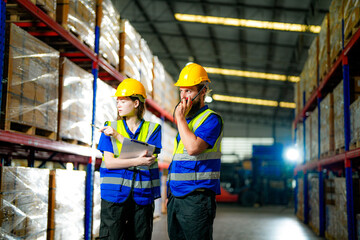 operation workers checking and inspecting cargo for stack items for shipping. males worker checking the store factory. industry factory warehouse. Worker Scanning Package In Warehouse.