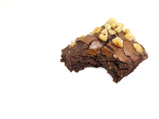 brownie cake with peanut topping isolated on white