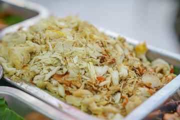 Crab meat in stainless steel tray 