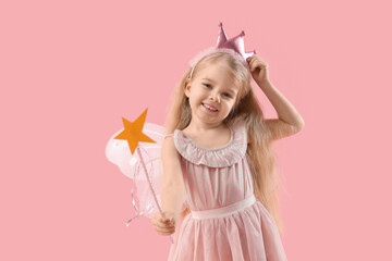 Cute little fairy with magic wand on pink background