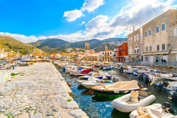 The harbor and port at the Greek island waterfront village of Hydra, one of the Saronic islands of...