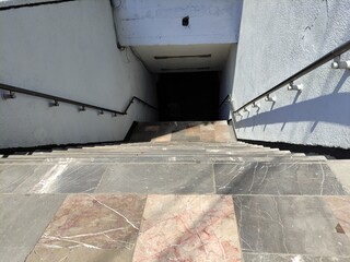 going up the stairs of a house
