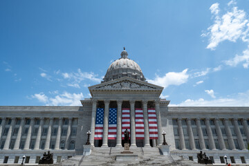 Missouri State Capitol Building in Jefferson City, Missouri with American Flag displayed