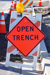 OPEN TRENCH warning road sign