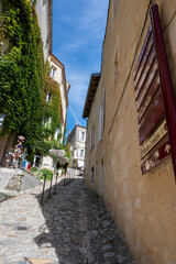 Views of old houses and streets of medieval town St. Emilion, production of red Bordeaux wine on cru class vineyards in Saint-Emilion wine making region, France, Bordeaux