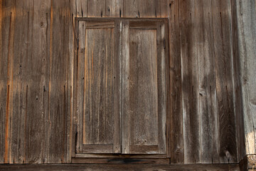 old wooden window with shutters