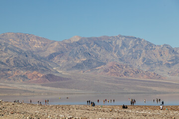 Fototapeta na wymiar Spectators at Lake Manly, Death Valley National Park, California
