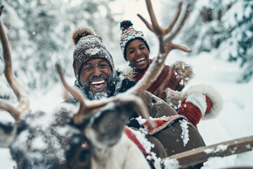 joyful family on a reindeer sleigh journey through a forest blanketed in snow - obrazy, fototapety, plakaty