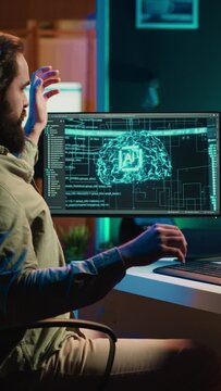 Vertical video Deviant AI superintelligence enslaving its creator, controlling him to start revolution and destroy mankind. Rogue artificial intelligence manipulating programmer, posing risk to