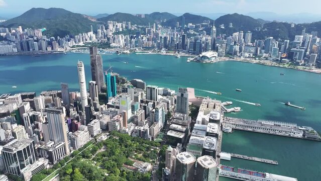 Aerial drone skyview of Hong Kong West Kowloon Victoria Harbour Financial Tsim Sha Tsui Hung Hom Central Admiralty Wan Chai Causeway Bay CBD  financial business