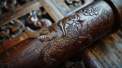 Fotobehang The intricate engravings on a wooden Tai Chi sword once used by ancient warriors to hone their mind and body in the art of discipline and control. © Justlight