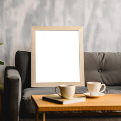 Wooden photo frame mockup on gray sofa in living room