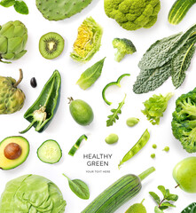 Creative layout made of avocado, pepper, kale, green peas, zucchini, alcachofas, cucumber,...