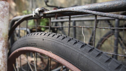 Fototapeta na wymiar A closeup on an old bicycle tires