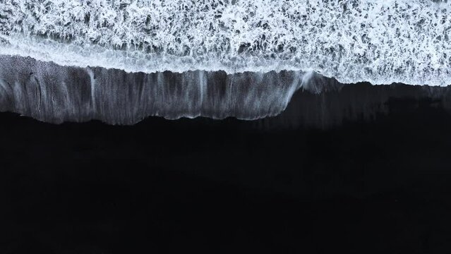 Abstract pattern in nature, Aerial view of black sand volcanic beach with crashing waves, Surreal nature drawing, Serene and tranquil landscape, Famous landmark of Iceland