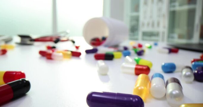Pills and bottles with pills on table concept