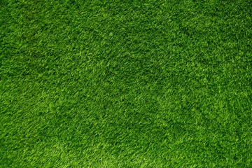Keuken spatwand met foto Green grass background, football field © waranyu