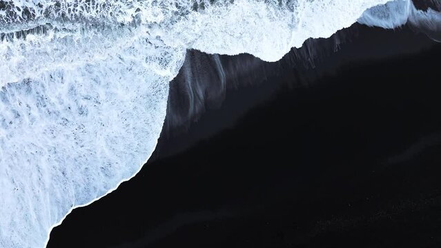 Abstract pattern in nature, Aerial view of black sand volcanic beach with crashing waves, Surreal nature drawing, Serene and tranquil landscape, Famous landmark of Iceland
