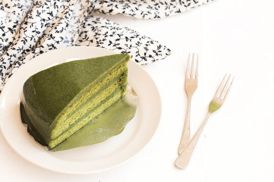green tea cake dessert snace delicious arrangement flat lay style on background white 