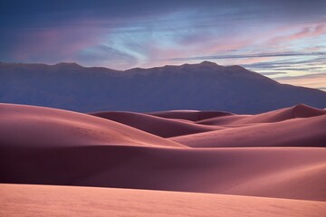 beautiful sand dunes under colorful sunset sky. White sand park. Alamogordo. New Mexico. USA