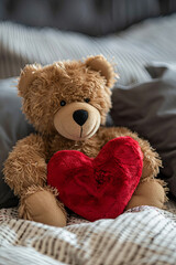 Adorable stuffed teddy bear holding a heart, concept of love and Valentine’s Day