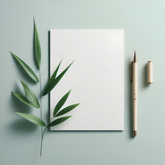 mockup Invitation card, greeting card, invitation card. empty white paper with bamboo leaf beside the paper