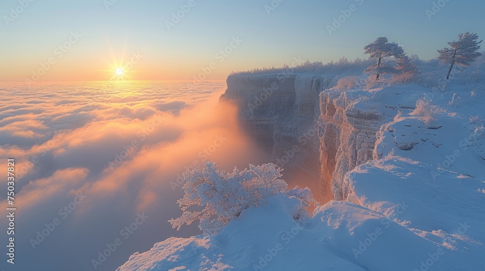 Poster the sun shines through the clouds above the cliffs of a cliff in the middle of a sea of fog and snow
