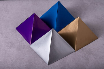 Still life with paper pyramids.