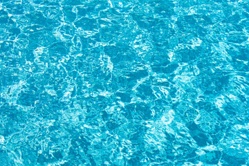 Pool water background, blue wave abstract or rippled water texture background.