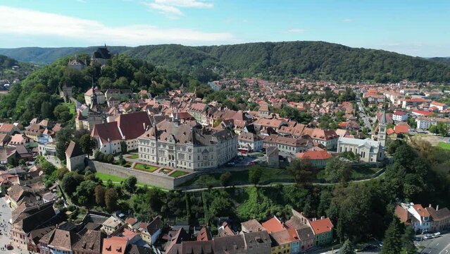 Sighisoara Medieval City and Old Town in Transylvania, Romania - Aerial 4k Circling