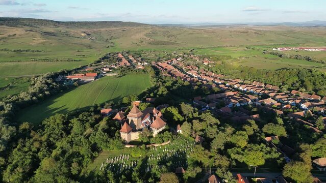 Viscri Village and Fortified Church in Transylvania, Romania - Aerial 4k Circling
