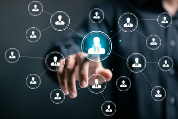 HR, human resources management concept. Businessman touching manager icon with connection link...
