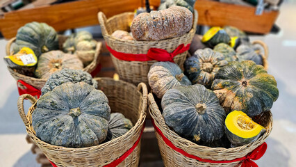 Pile of pumpkin in basket in a local market in Thailand, Organic pumpkin in supermarket. Basket...