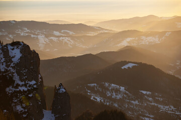 Beautiful sunrise at winter in Ceahlau Mountains, Romania